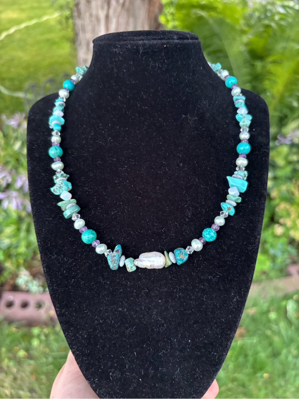 Handcrafted turquoise and pearl necklace.